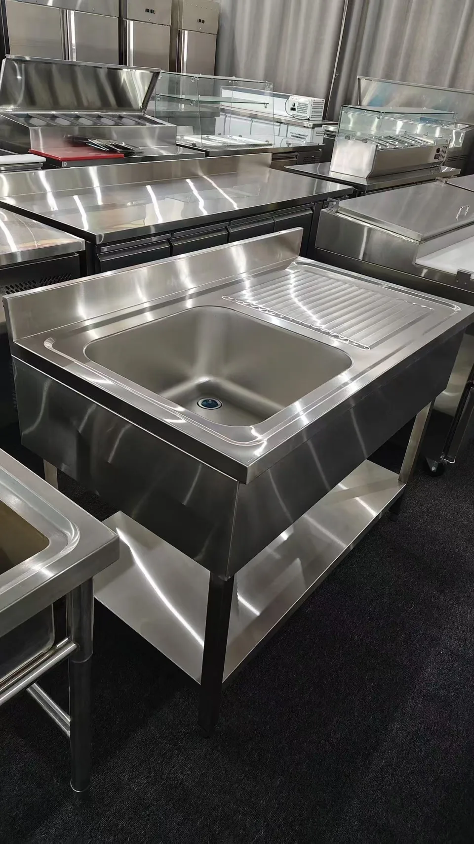 Stainless single-bowl sink bench with drainboard and undershelf